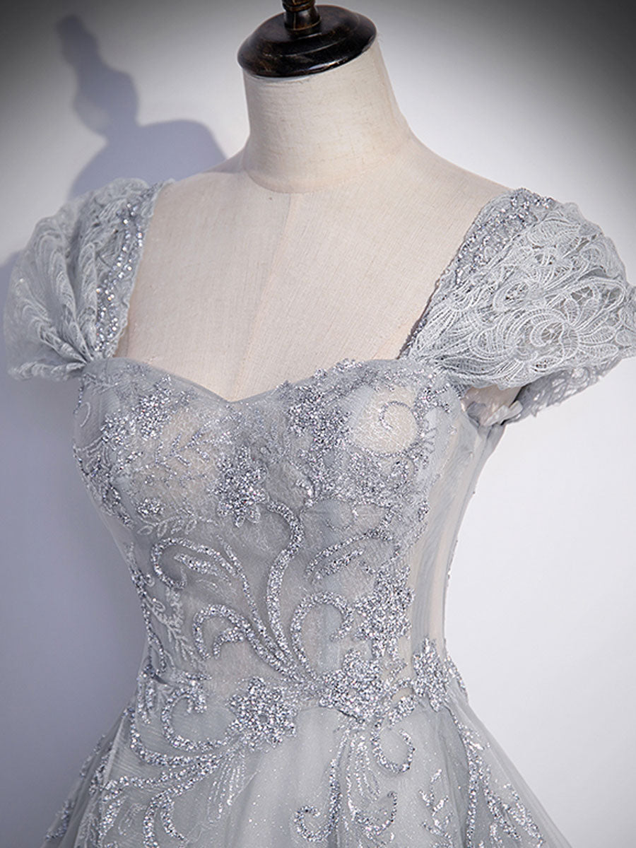 Abito a trapezio in tulle grigio con paillettes