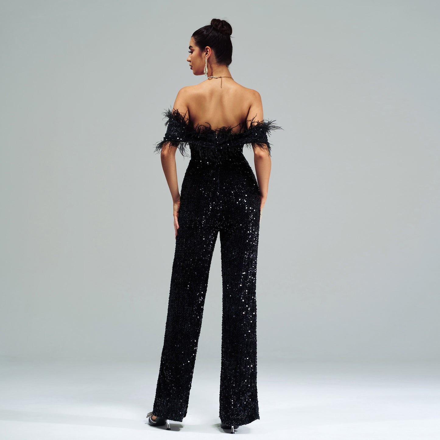 off-shoulder sequin feather jumpsuit in black