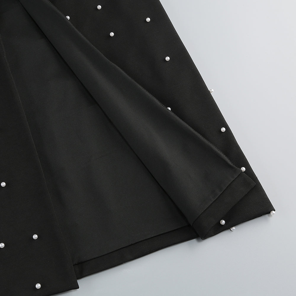 abito senza spalline decorato con perle in nero