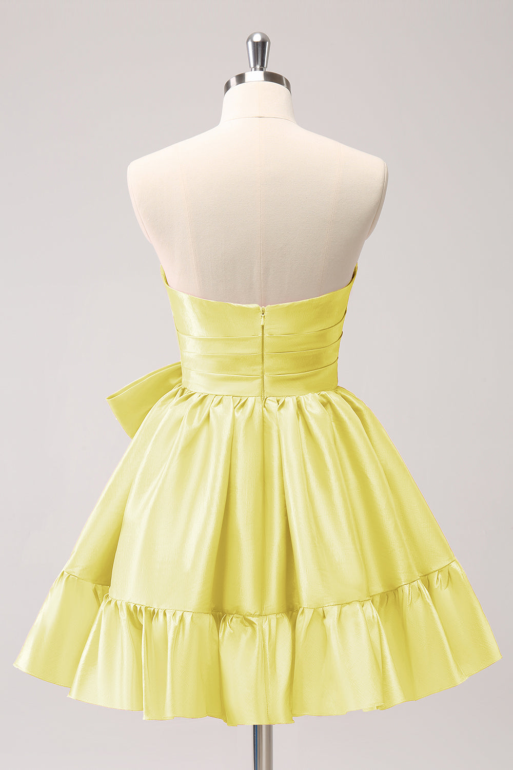 Abito da ballo corto fucsia senza spalline con volant e fiocco