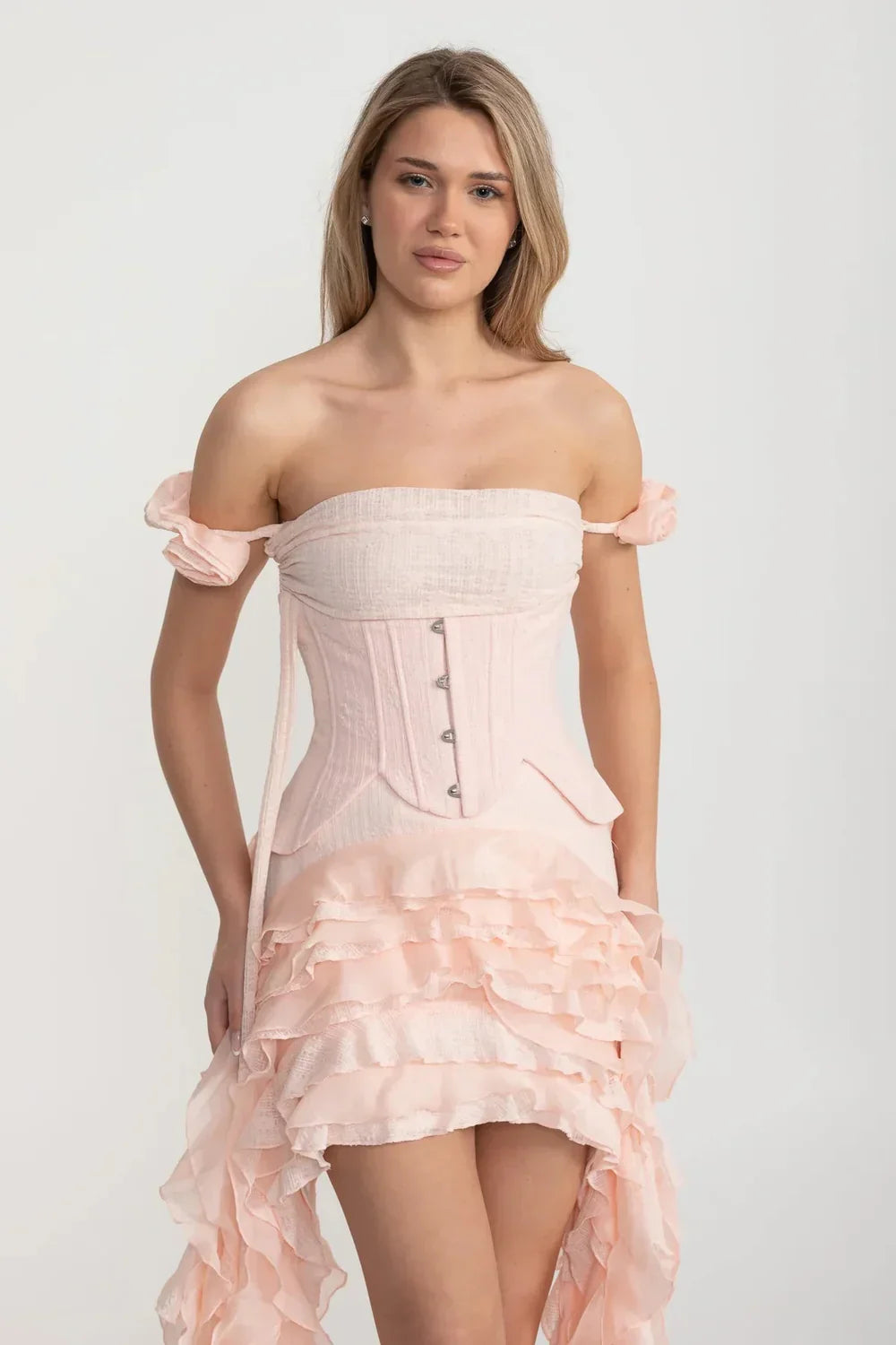Vintage Inspired Corset Dress With Ruched Bustier And Flowing Ruffled Side Details - Pink