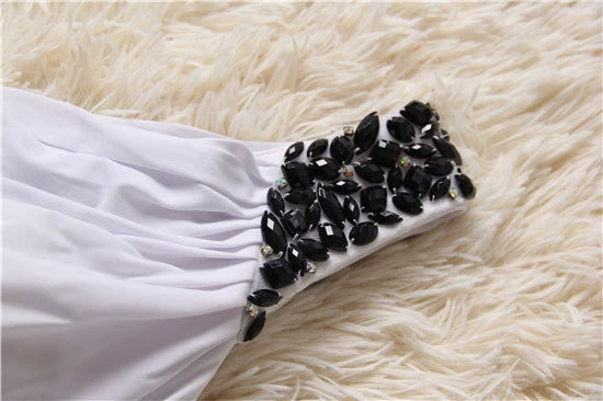 Mini abito da sera monospalla in maglia elasticizzata bianca