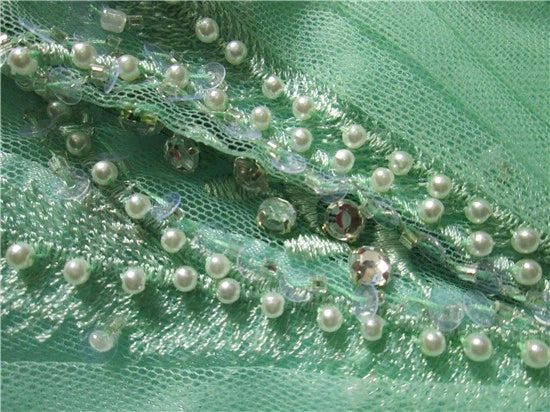 Green chiffon long beaded evening gown