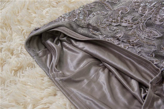 Gray hip-hugging embroidered and beaded evening dress