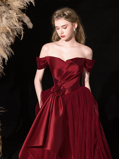 off-shoulder bow satin maxi dress in Bordeaux