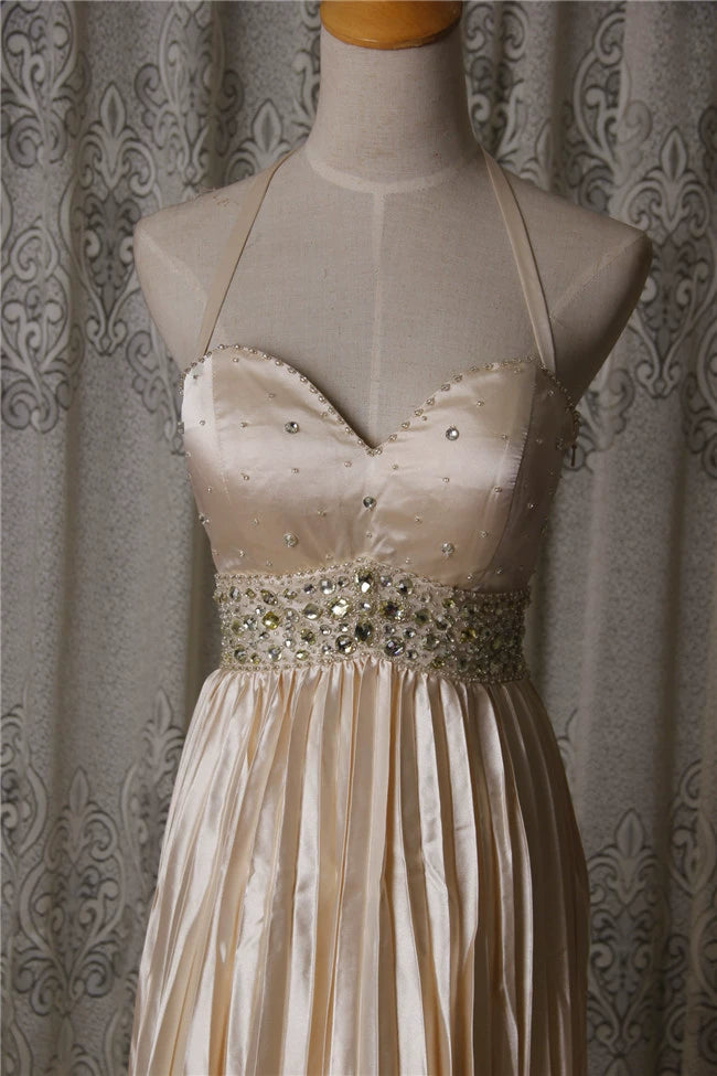 Champagne color pleated beaded evening gown