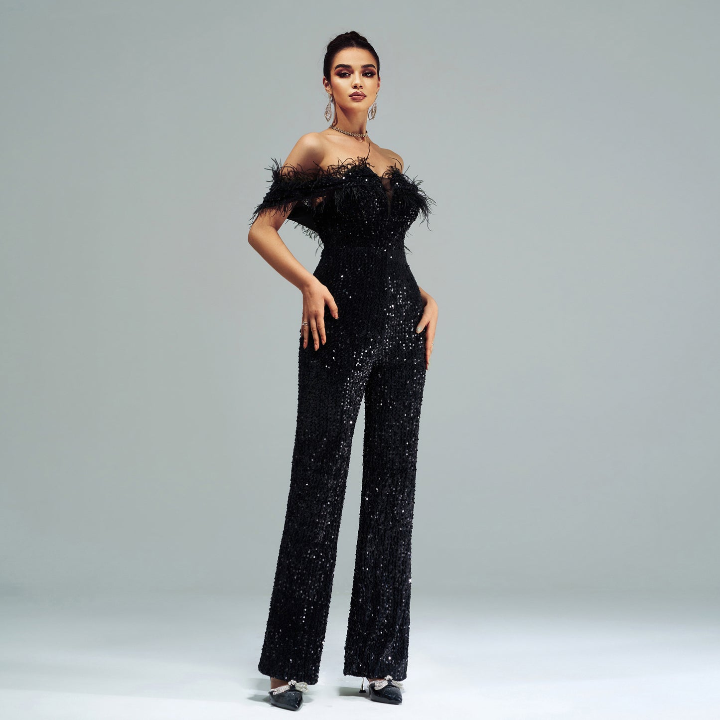 off-shoulder sequin feather jumpsuit in black
