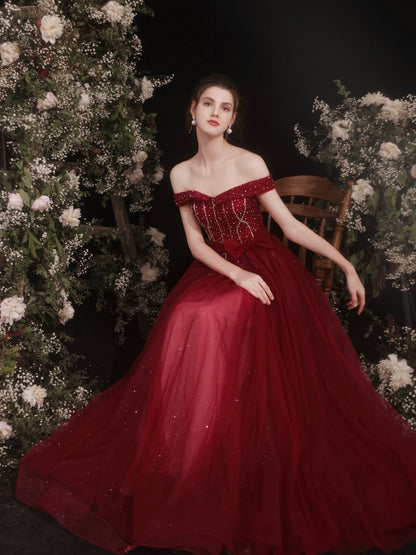 lily off-shoulder sequin maxi dress in Claret