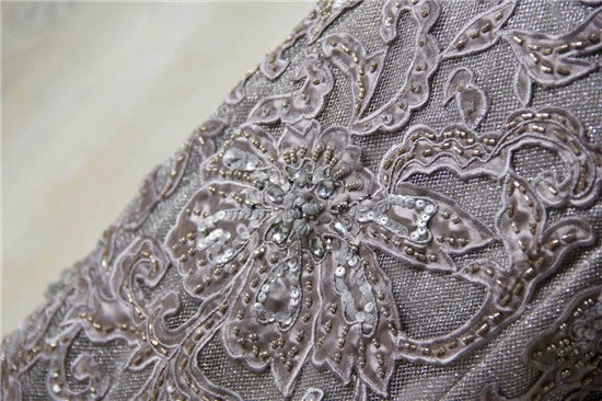 Gray hip-hugging embroidered and beaded evening dress