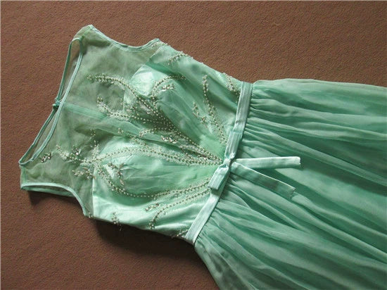 Green chiffon long beaded evening gown