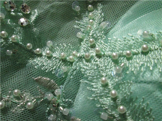 Green chiffon long beaded evening gown