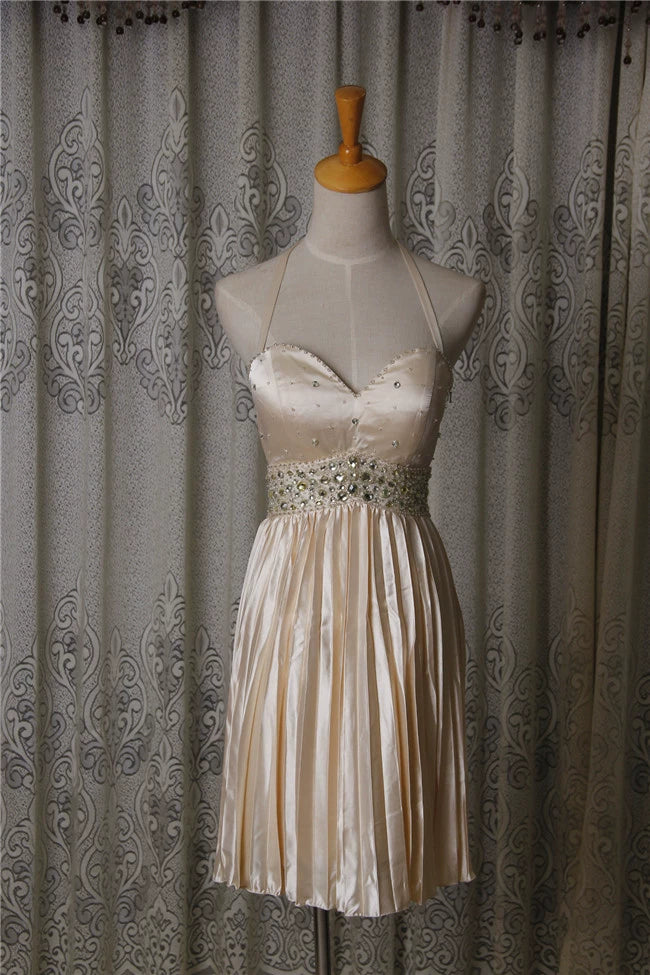 Champagne color pleated beaded evening gown