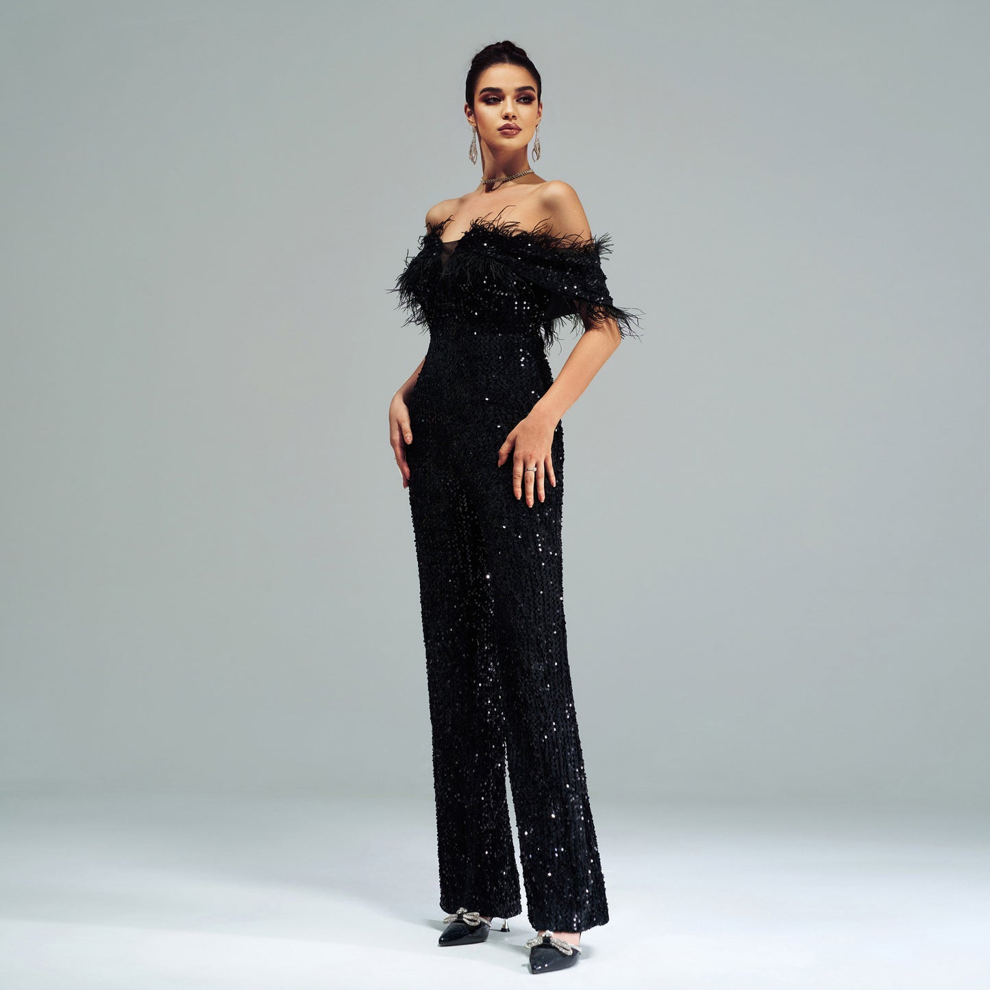 off-shoulder sequin feather jumpsuit in black