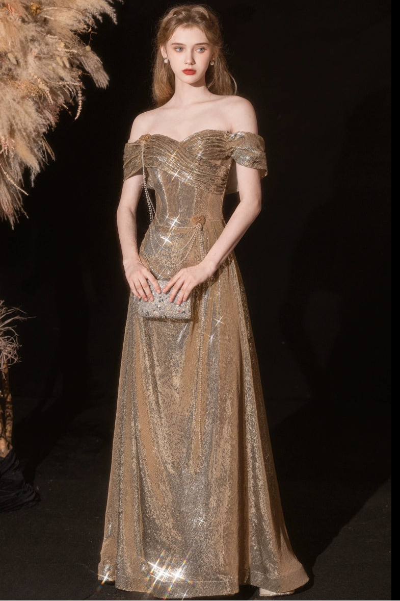 Gold sequined pleated strapless fishtail gown