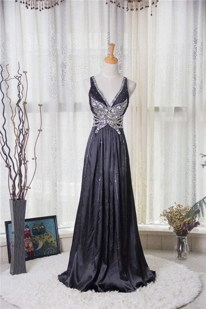 Black satin backless evening gown with ties
