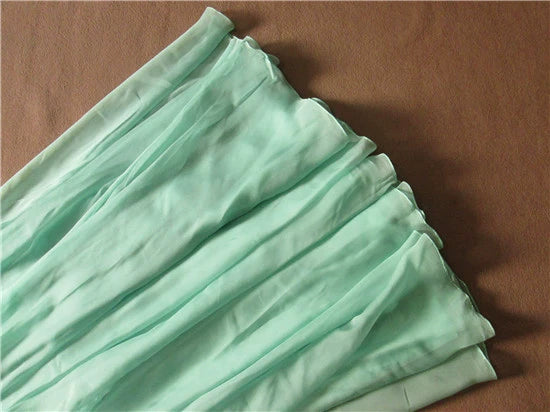 Green chiffon long beaded evening gown