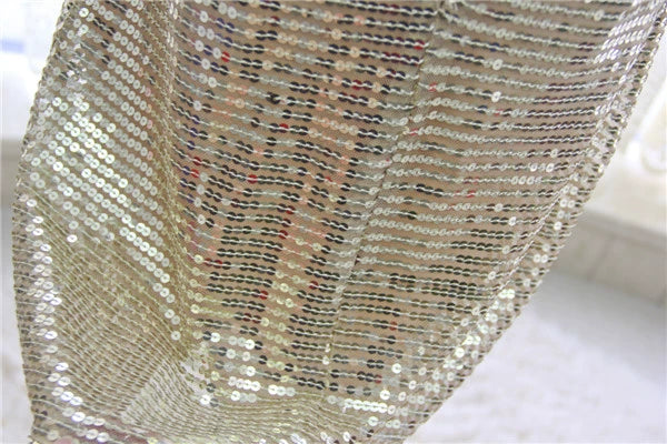 Gold sequined mini vest dress