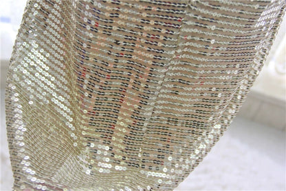 Gold sequined mini vest dress