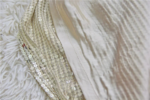 Gold sequined mini vest dress