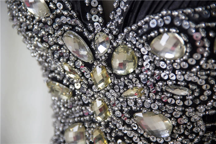 Black satin backless evening gown with ties