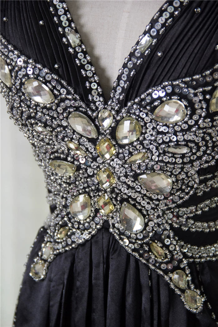 Black satin backless evening gown with ties