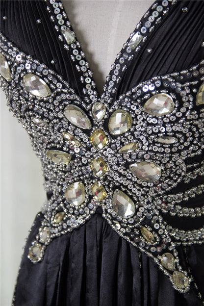 Black satin backless evening gown with ties