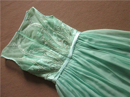 Green chiffon long beaded evening gown