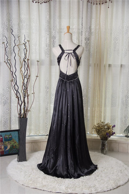 Black satin backless evening gown with ties