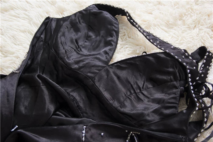 Black satin backless evening gown with ties