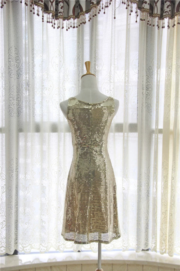 Gold sequined mini vest dress