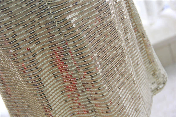 Gold sequined mini vest dress