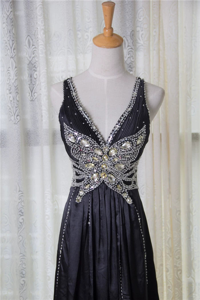 Black satin backless evening gown with ties