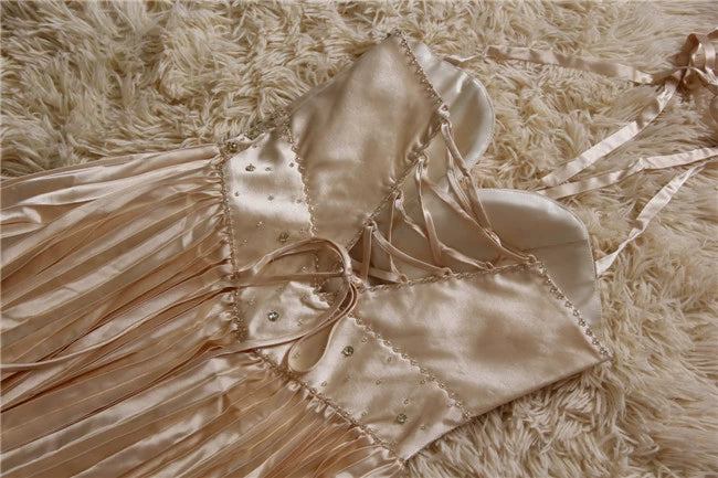 Champagne color pleated beaded evening gown